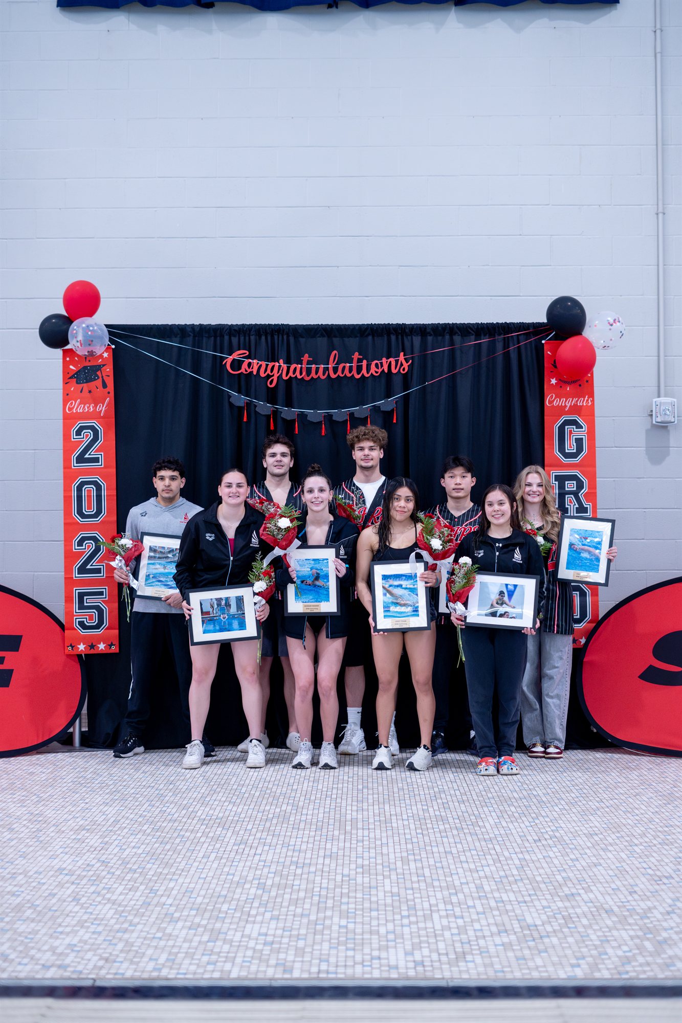 A group photograph marking completion of the SPIRE swim training period in 2025.